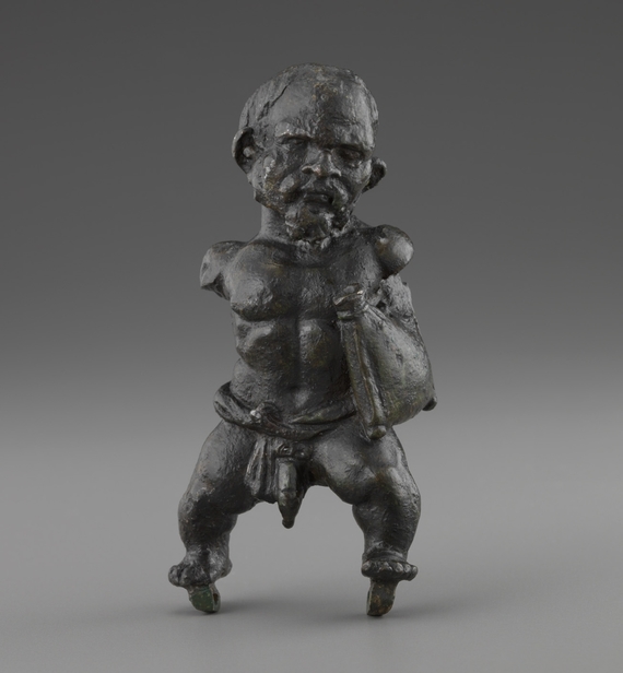 Statuette d'esclave nain portant une outre