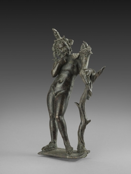Statuette d'Harpocrate debout, appuyé sur un pied de vigne